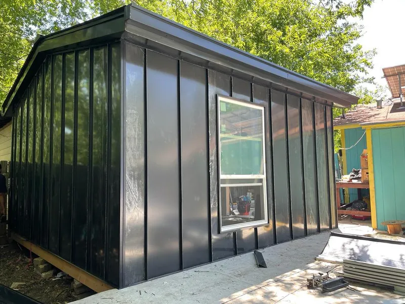 Black standing seam metal wall panels for Roof Inspection in San Rafael